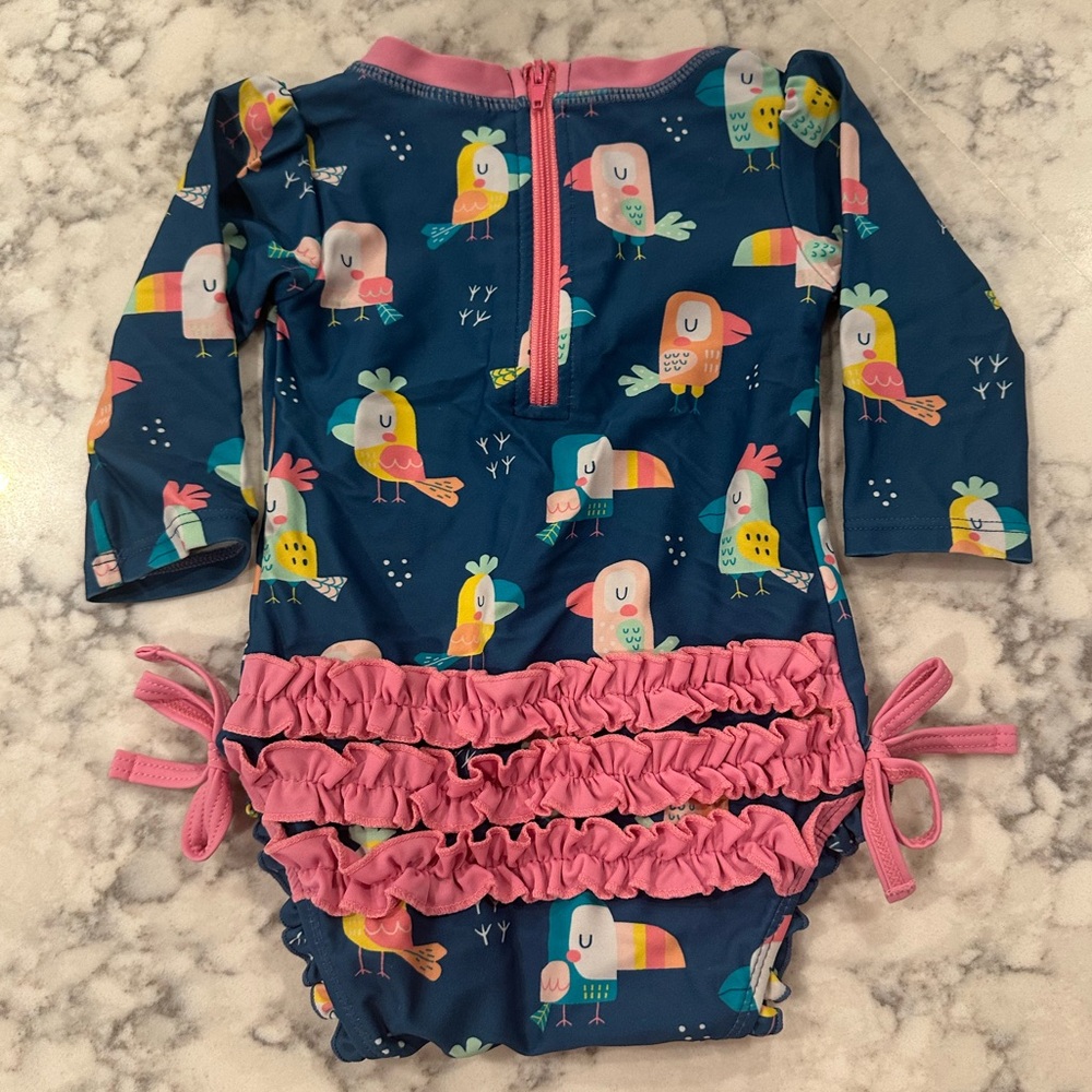 Ruffle Butts Toucan Print Long Sleeve UPF Swimsuit Rash Guard 6-9M